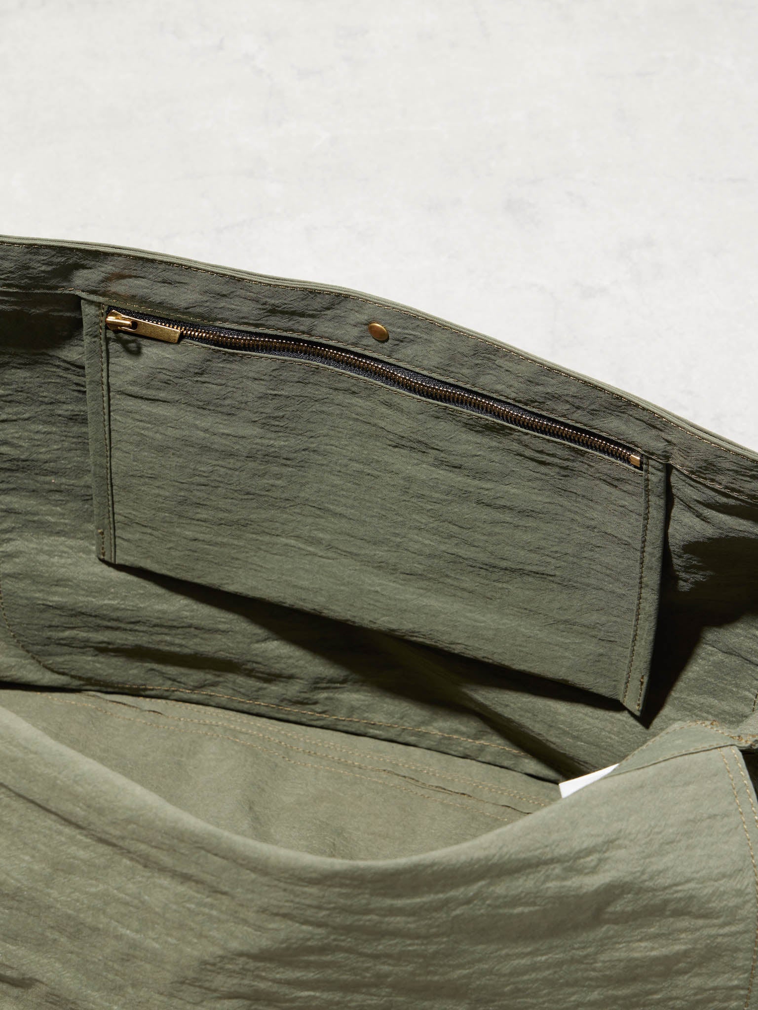 NEWSPAPER / SHRINK-ReNY