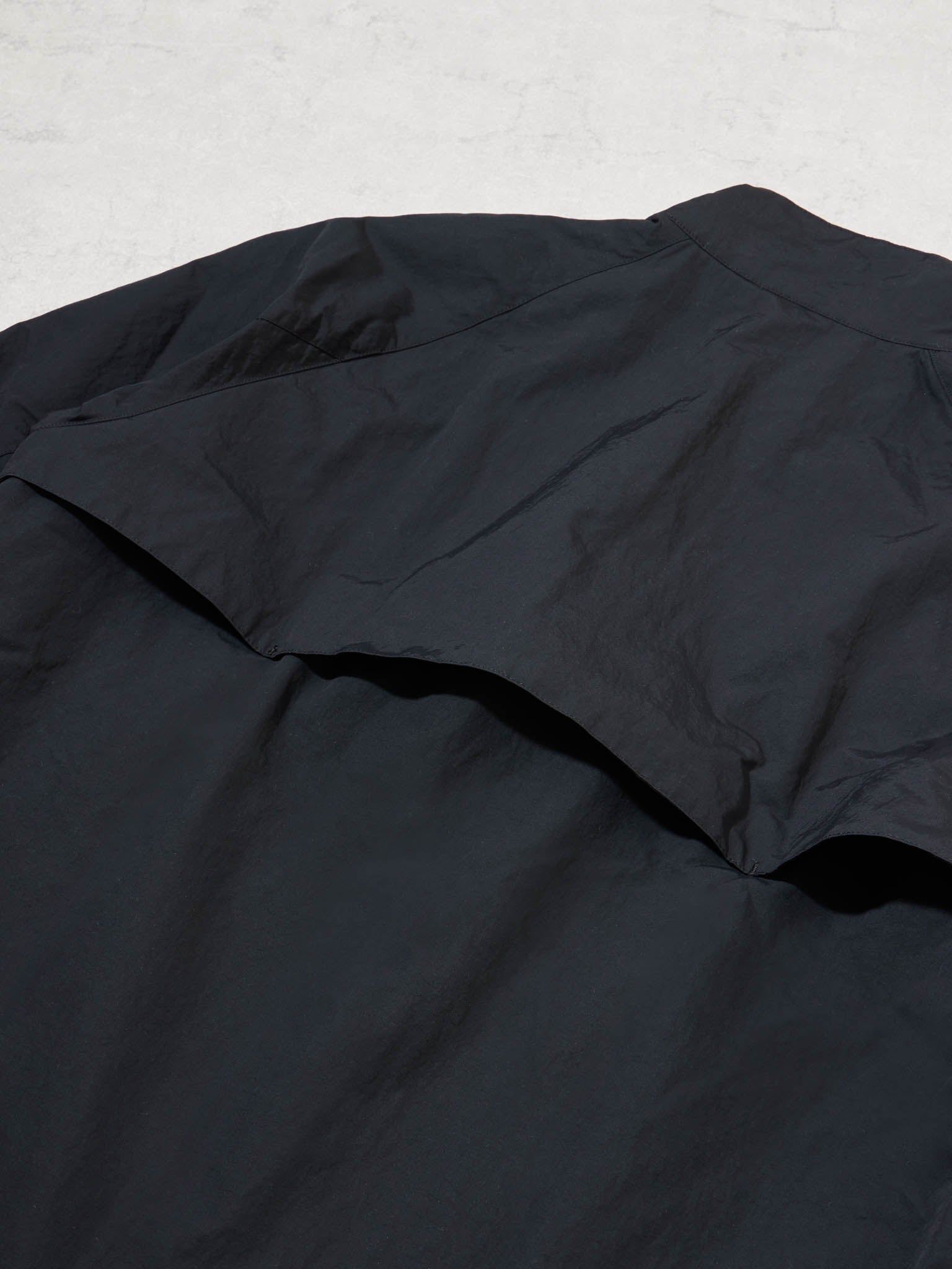 BAGLESS DRAWSTRING BLOUSON