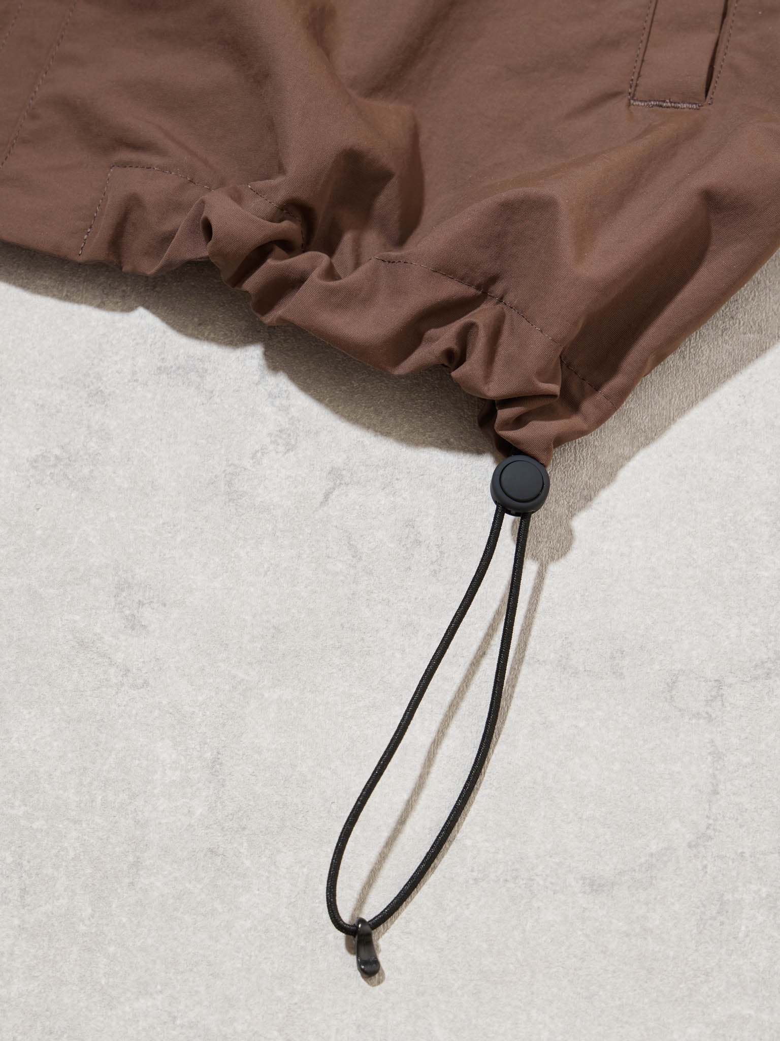 BAGLESS DRAWSTRING BLOUSON