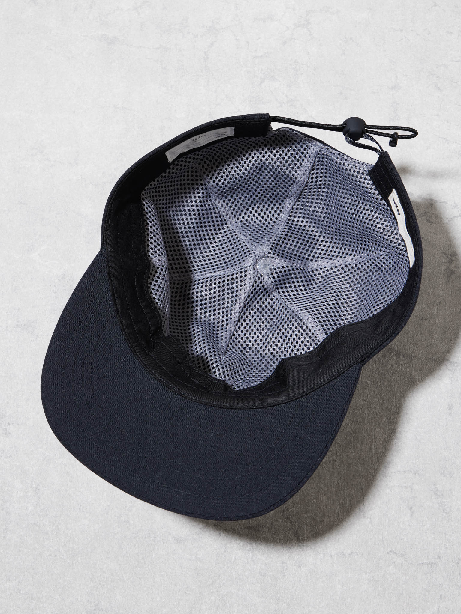 TREFOIL PANELLED CAP