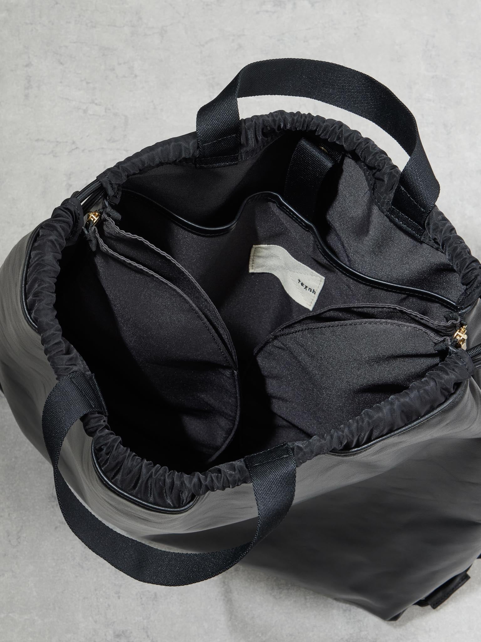 TRIANGLE KNAPSAC / LEATHER