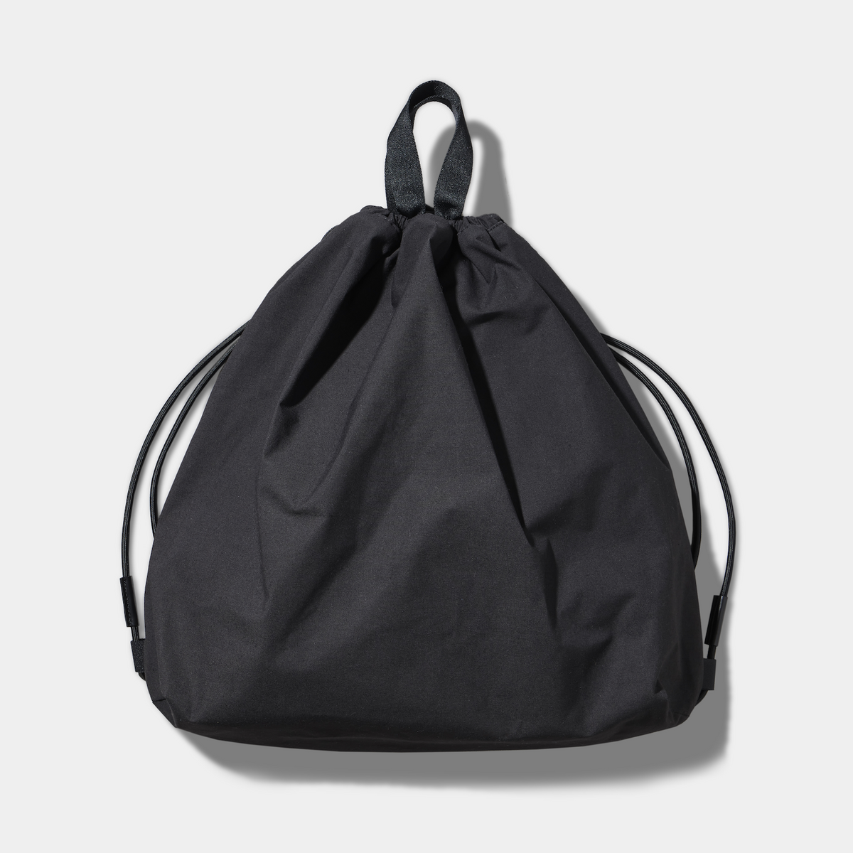 threetimes ナップサック TRIANGLE KNAPSAC / LOOPTEX